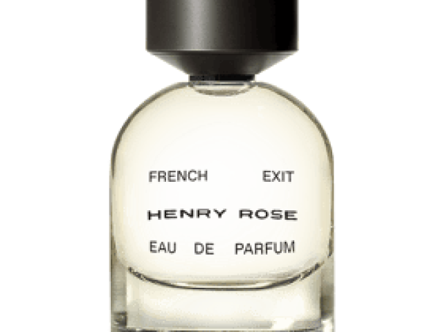 Photo: round glass perfume bottle with black cap, pale yellow liquid, label 'French Exit'
