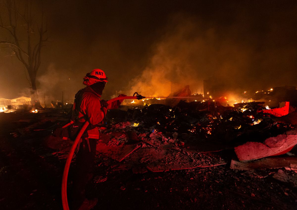 Firefighter in Greenville, Calif. battling the 2021 Dixie Fire