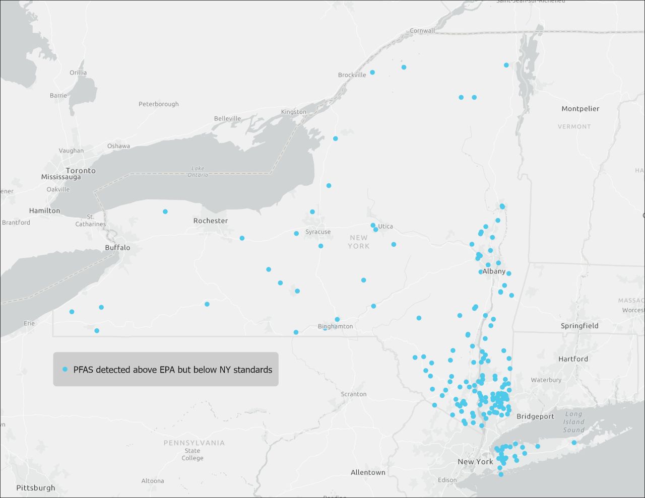 Map showing locations with PFAS detected above EPA but below NY standards, marked with blue dots.