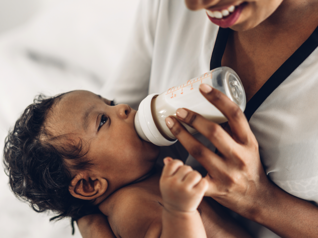 Baby drinking from bottle