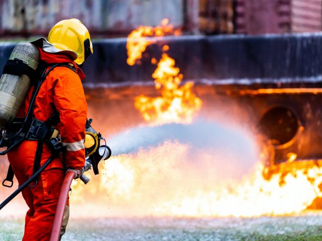 Firefighter fighting fire