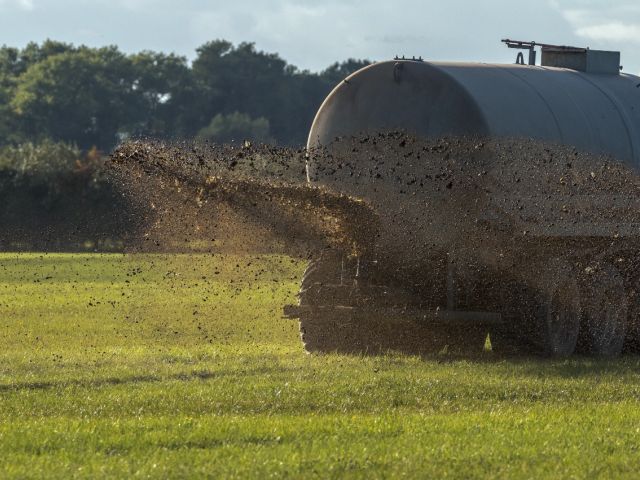 Truck applying manure