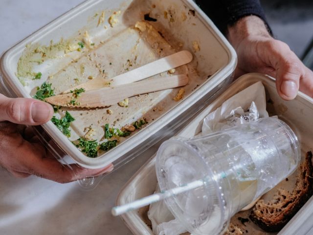 Person holding food container