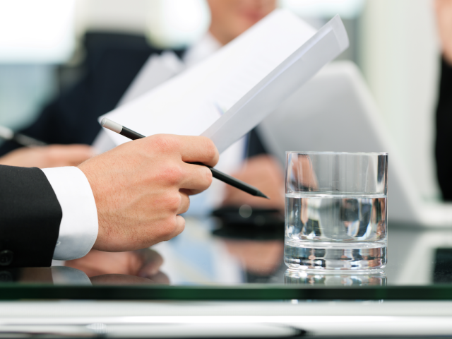 Hand holding a document