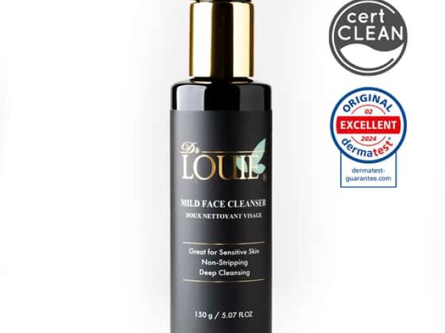 Black pump bottle of Dr. LOU mild face cleanser with various certification logo stickers.