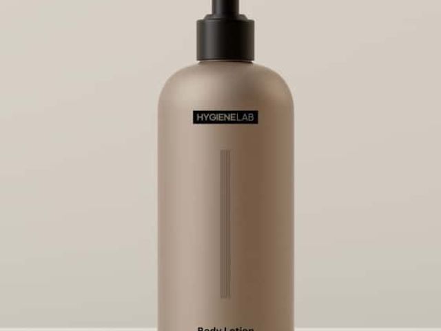 Brown bottle of body lotion with a pump lid and minimalistic label design.
