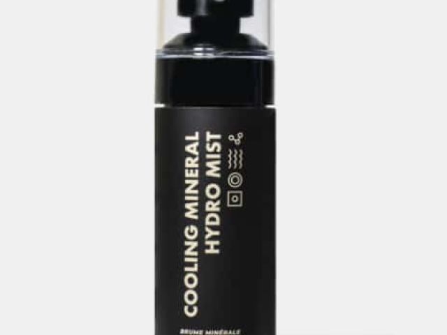 Black spray bottle labeled "Cooling Mineral Hydro Mist" with a clear cap.