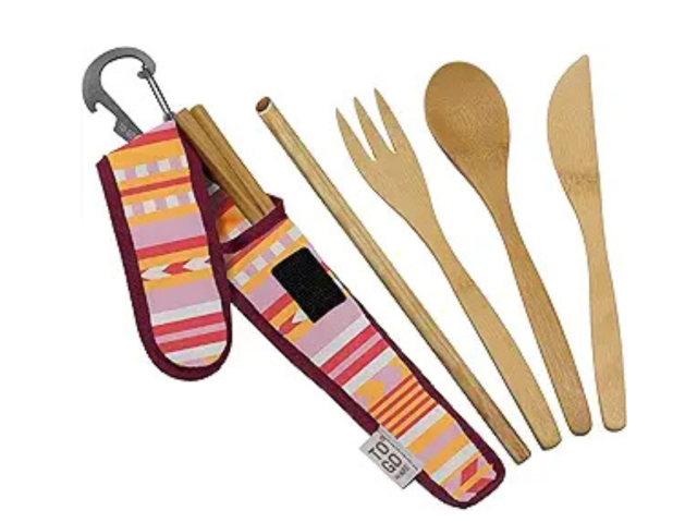 Bamboo utensil set in a colorful pouch, including a fork, spoon, knife, and straw.