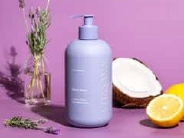 Lavender and lemon-themed product display with a purple backdrop.