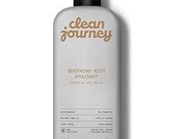 A gray bottle of "Clean Journey" soothing mist with a black lid and minimalist design.