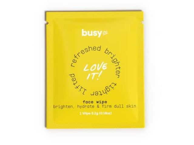 Yellow packaging for Busy face wipes, featuring the text "Love It!" and instructions.