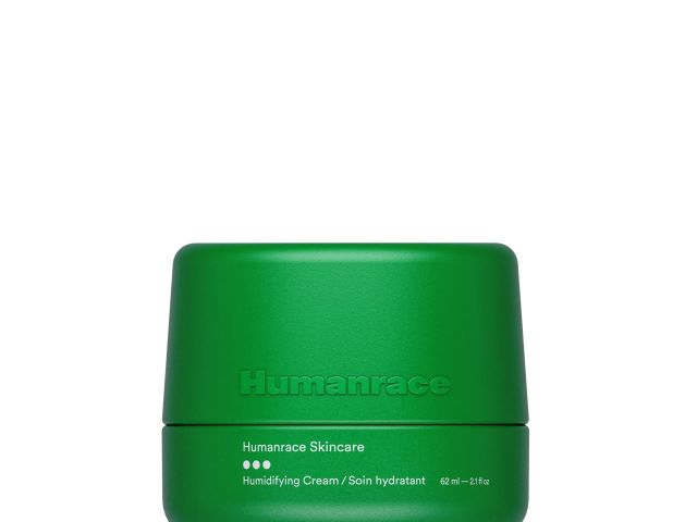 Green skincare jar with a textured surface, labeled "Humanrace Skincare," containing humectant cream.