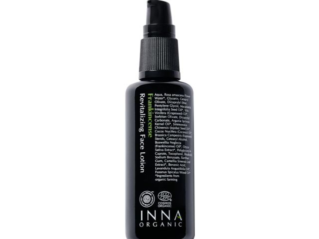 Black bottle of INNA Organic Revitalizing Face Lotion with a pump top and ingredient list.