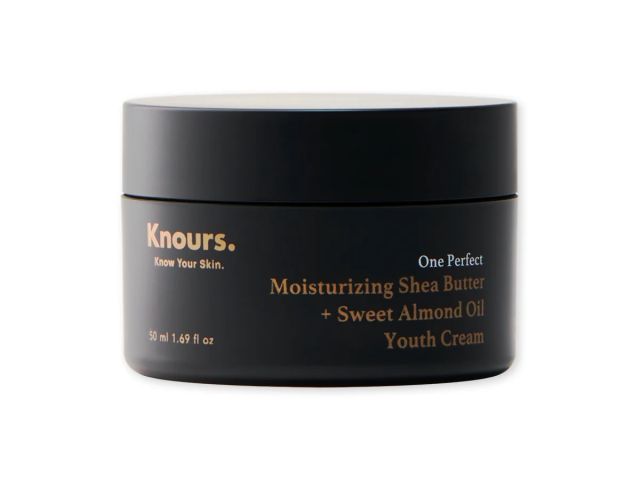 Black jar of Knours moisturizing cream with gold lettering, labeled "Youth Cream."