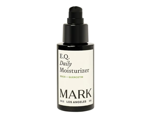 Black bottle of daily moisturizer labeled "E.Q. Daily Moisturizer" with a pump top.