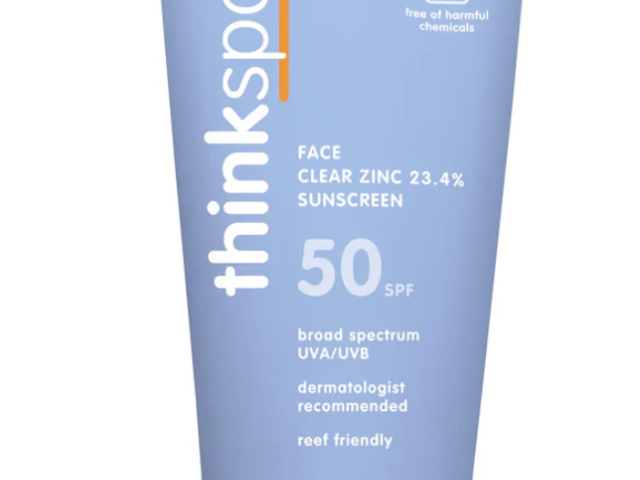 Clear zinc sunscreen tube labeled "thinksport," SPF 50, 2 oz, with a light blue design.