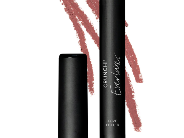 Lip crayon in neutral medium pink with its cap removed, accompanied by matching swatches.