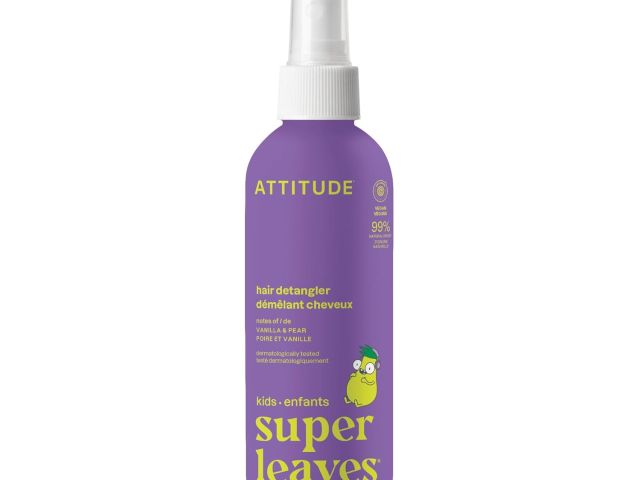 Purple spray bottle labeled ATTITUDE Super Leaves kids hair detangler with green leaf mascot