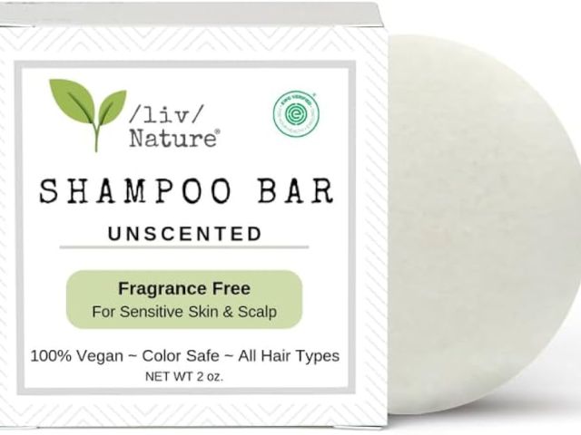 Photograph: white unscented shampoo bar beside white branded box labeled Fragrance Free