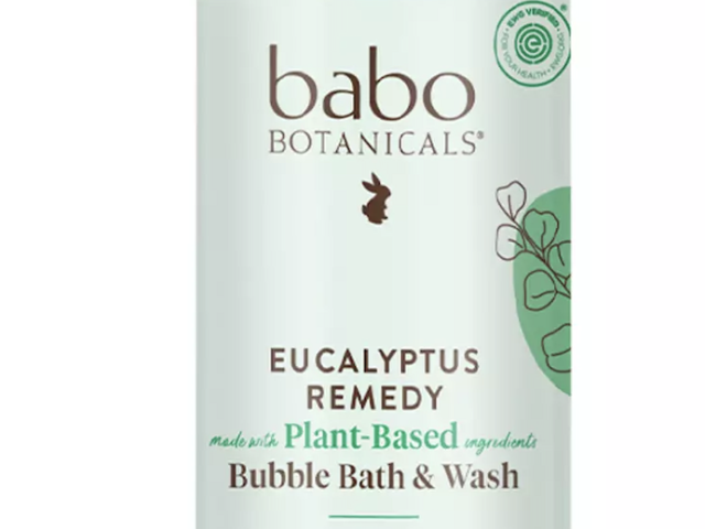Photograph of Babo Botanicals Eucalyptus Remedy bubble bath bottle with mint-green label and cap.