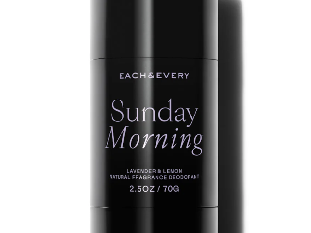 Black deodorant stick (photograph) labeled 'Sunday Morning', lavender & lemon scent