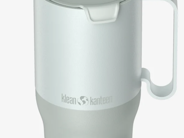 Pale sage insulated travel tumbler with handle, flip lid, angled straw and Klean Kanteen logo.