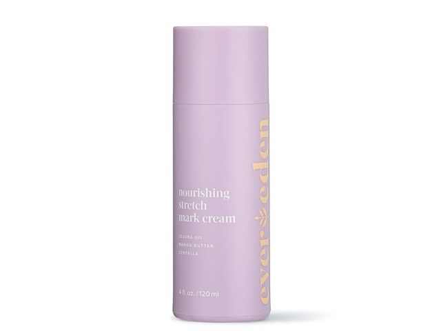 Product photograph: lavender pump bottle of nourishing stretch mark cream on white