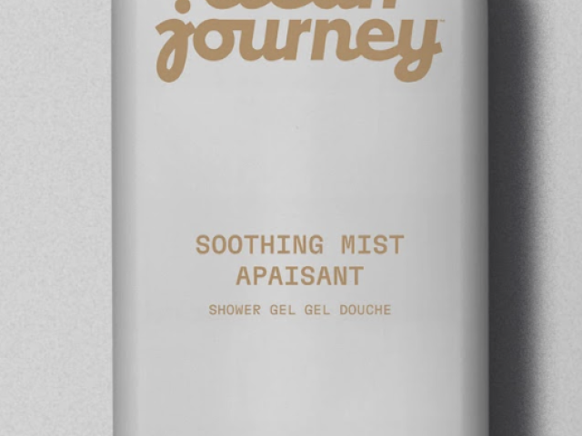 Photograph of white shower gel bottle with black cap, 'clean journey' logo, Soothing Mist label