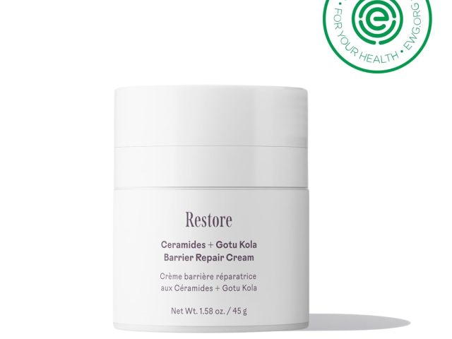 Photograph: white "Restore" barrier repair cream jar with EWG Verified logo
