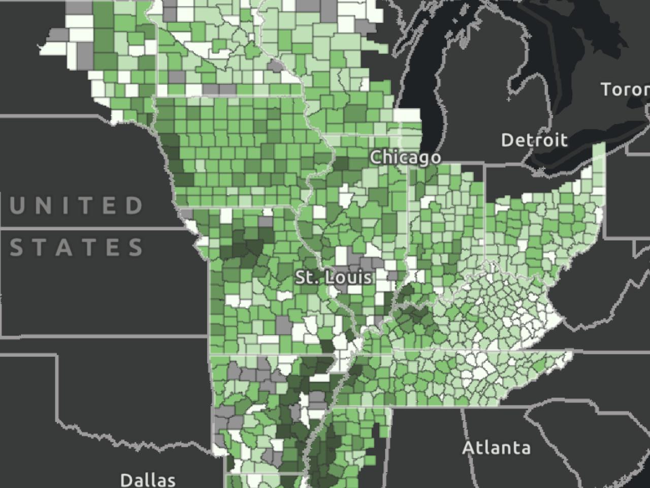 A map of the central United States showing varying shades of green and gray across counties.