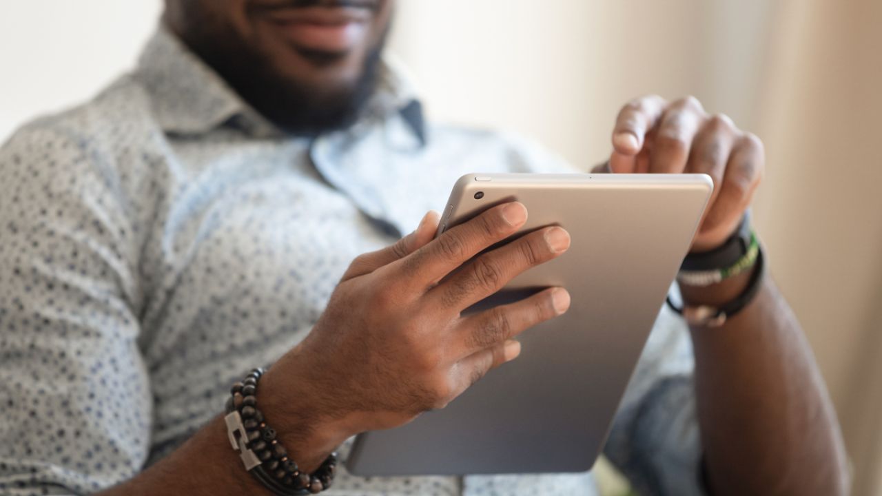 Person reading tablet