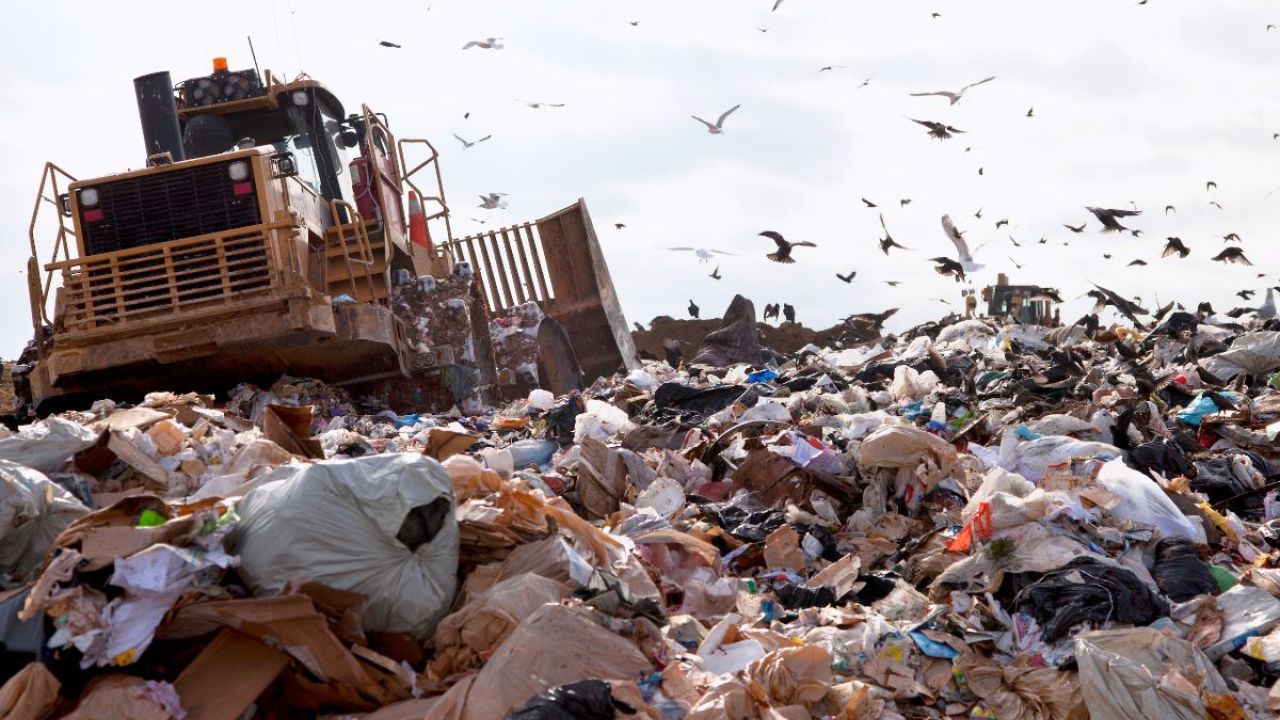 Truck dumping at landfill