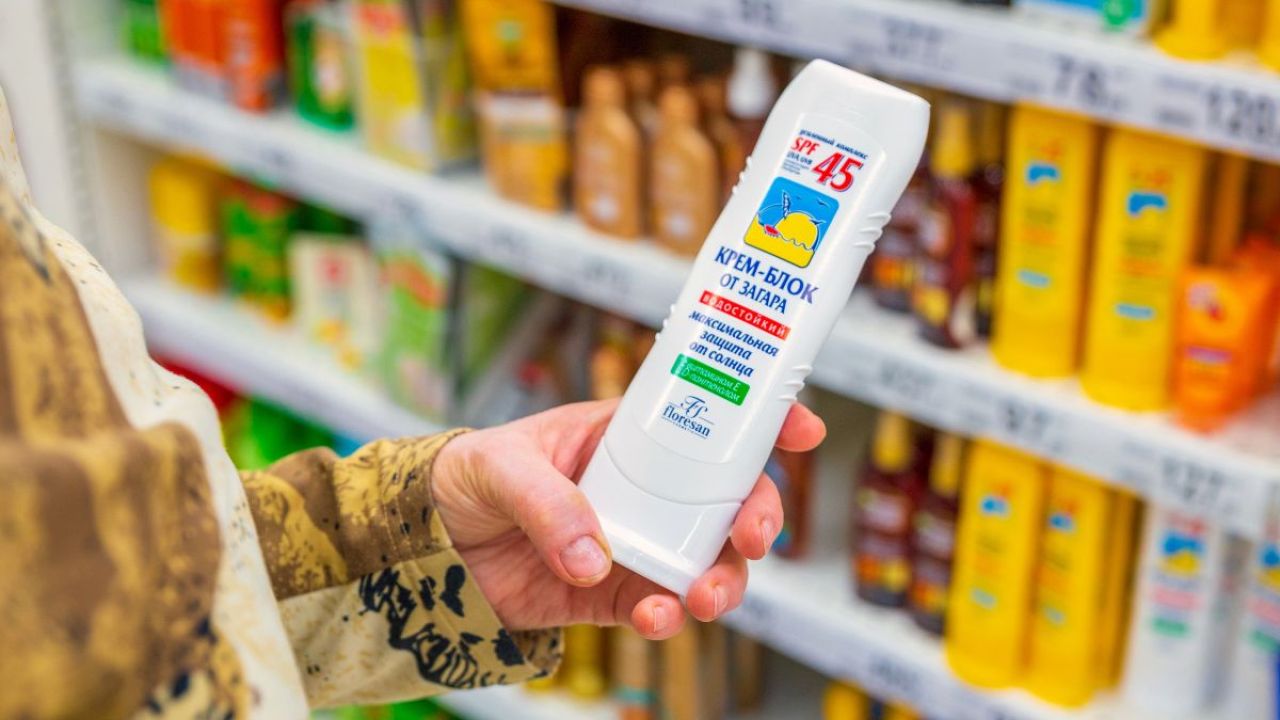 Person looking at an international sunscreen